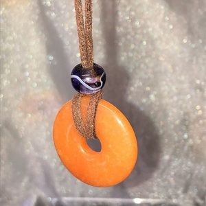 Donut shaped orange gemstone necklace